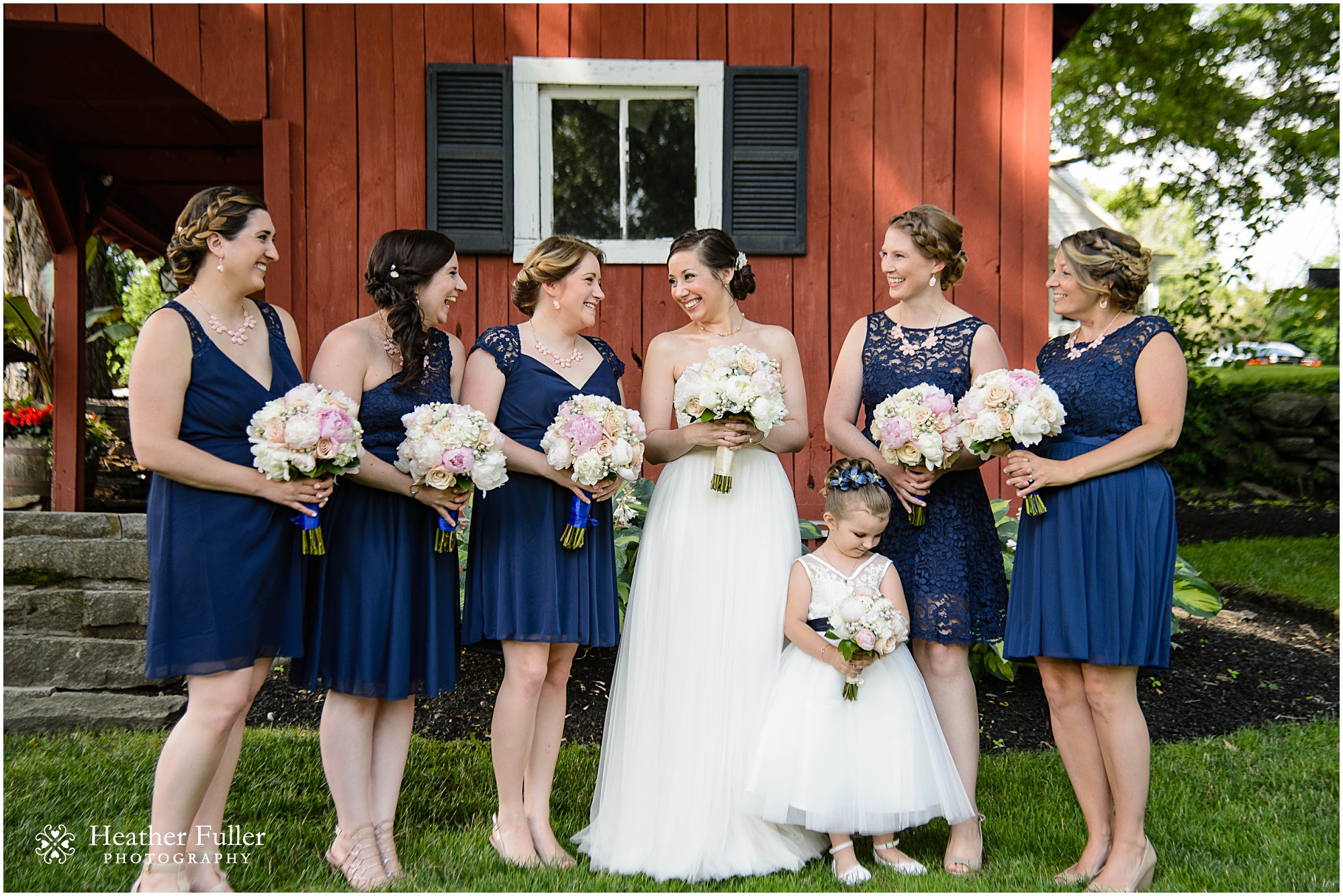 bridesmaids_navy_blue_dresses_white_pink_flowers