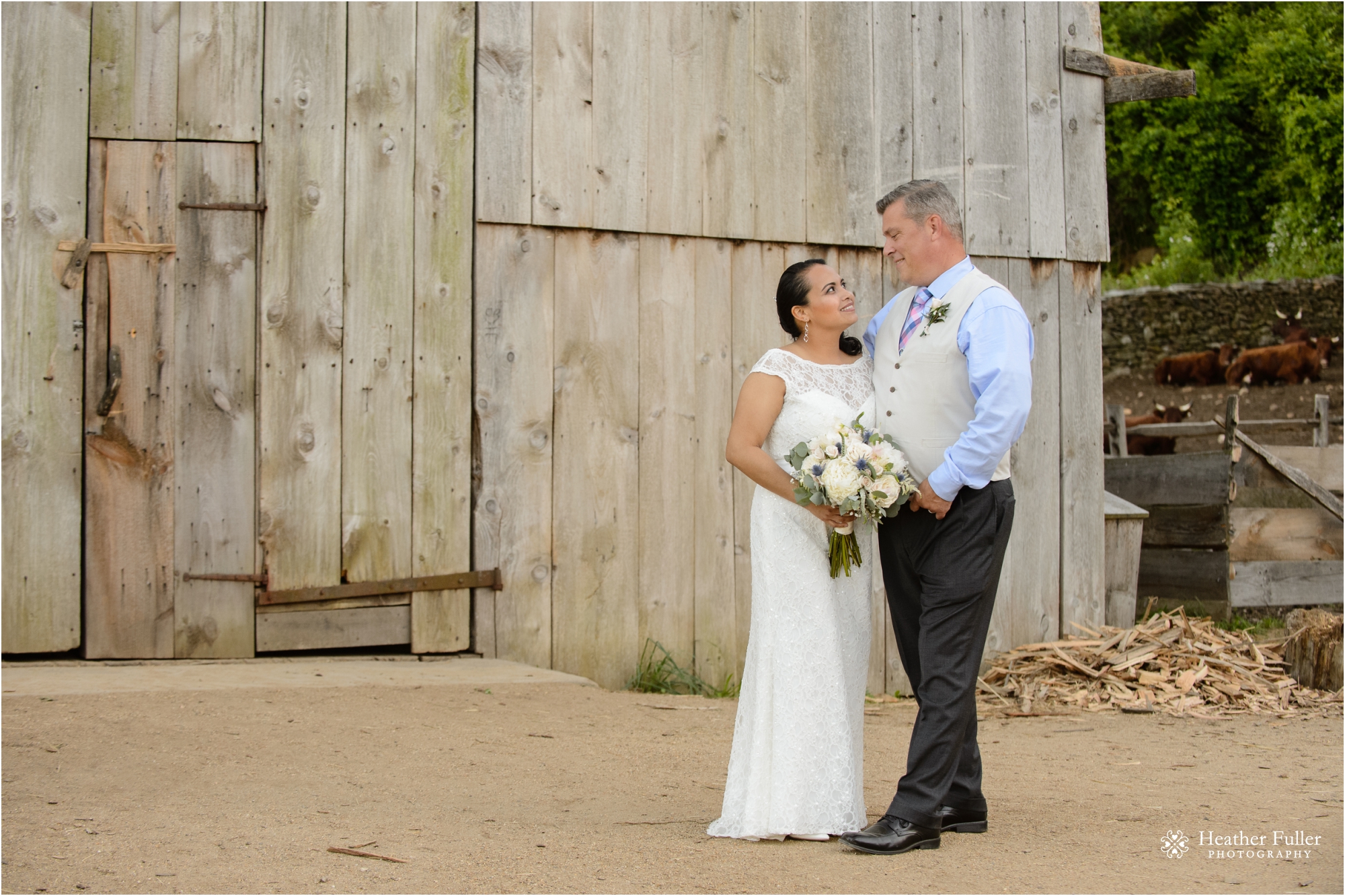 bride and groom barn rustic portrait